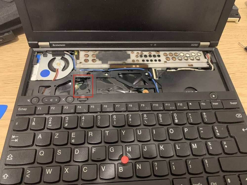 keyboard down, motherboard almost visible